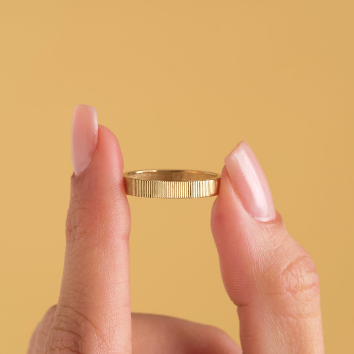 yellow_gold_ribbed_ring