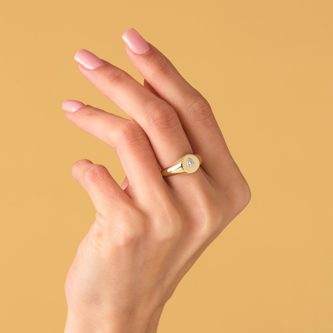 pear diamond signet ring